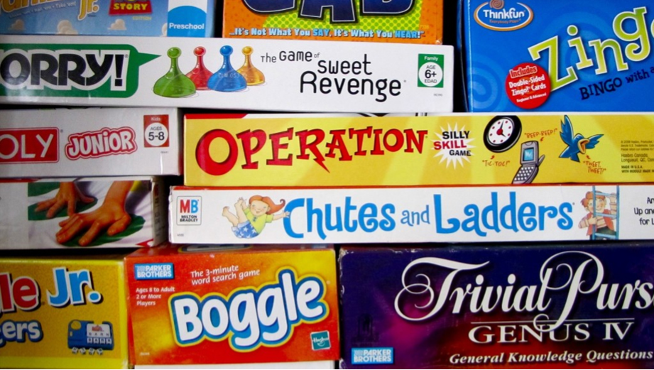 stack of board game boxes