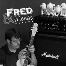 Fred with a guitar