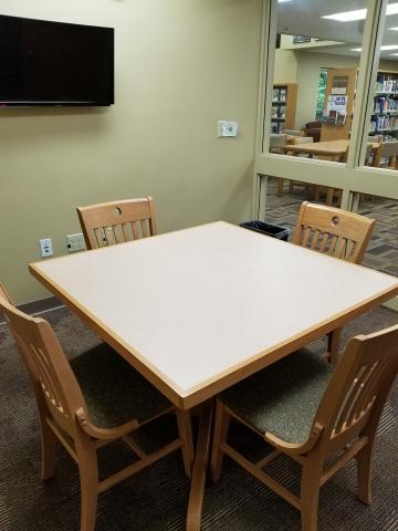 Farrell CPAs Literacy Room with a square table and four chairs
