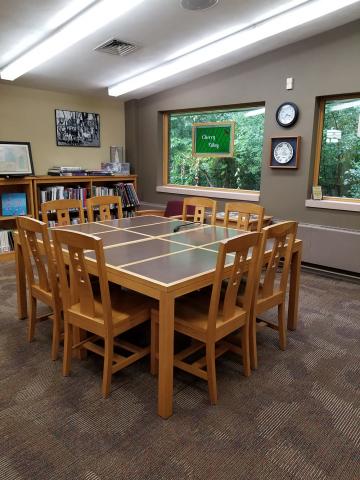 Woodside Room with large square table and chairs