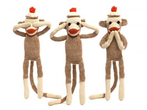 three sock monkeys