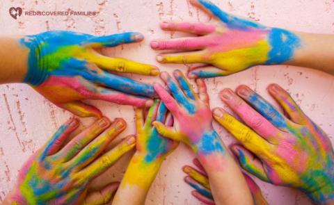 Photo of family hands with paint