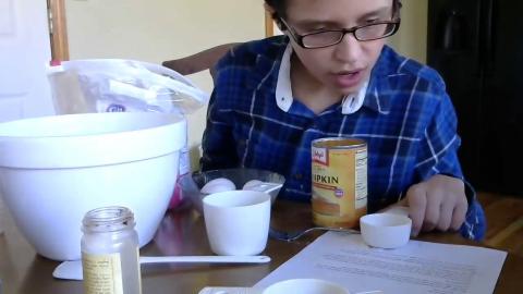 kid mixing pumpkin pie