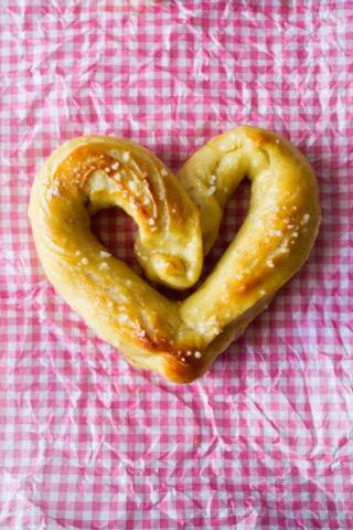 heart-shaped pretzel on gingham background