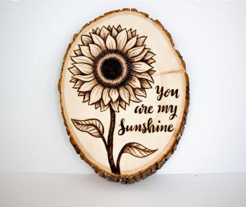 Wood burned sunflower plaque