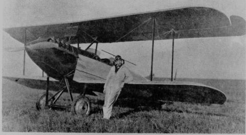 Fred Machesney in front of plane