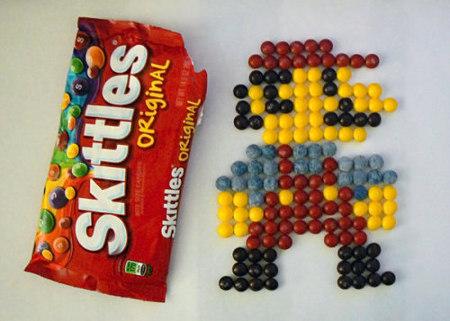 package of skittle candy and image of nintendo mario made out of skittles