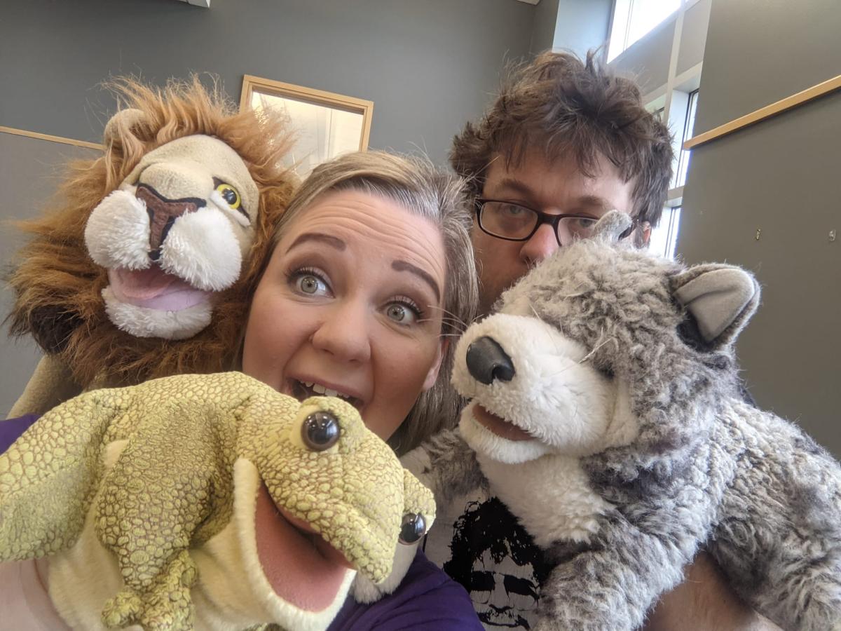 Animal puppets and performers faces